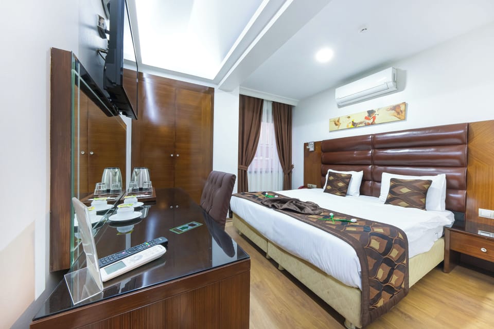 Premium bedding, minibar, in-room safe, laptop workspace