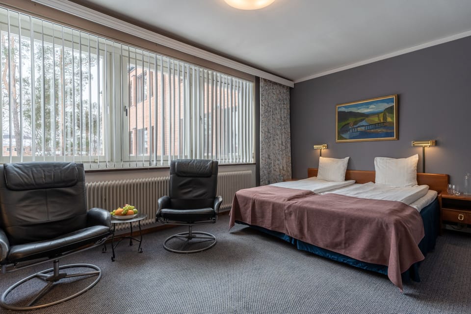Economy Double or Twin Room | Desk, blackout drapes, free WiFi, bed sheets