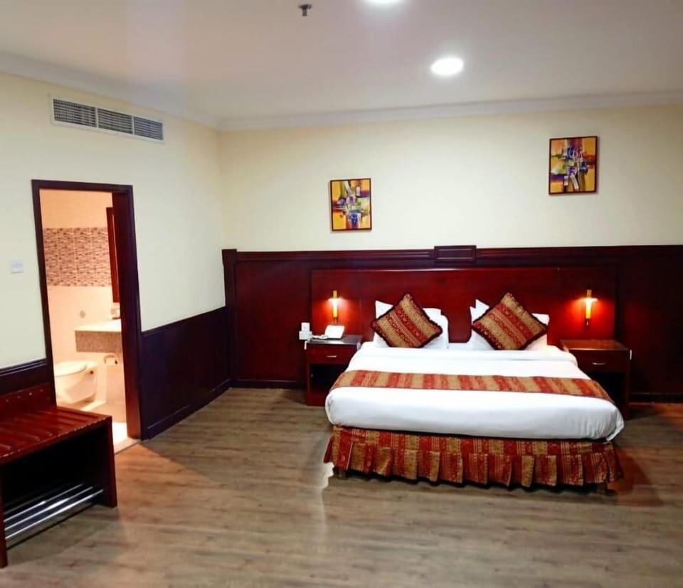 Deluxe Double ( Single and double occupancy ) | Minibar, in-room safe, desk, iron/ironing board (on request)