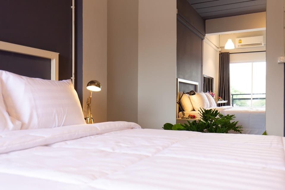 Standard Triple Room | Desk, blackout drapes, soundproofing, free WiFi