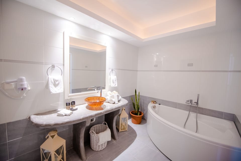 Honeymoon Room, Patio, Pool View | 1 bedroom, minibar, in-room safe, individually decorated