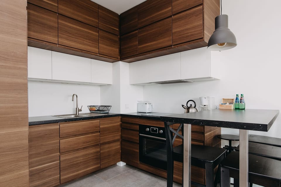 Exclusive Apartment, City View | Private kitchen | Full-size fridge, oven, stovetop, dishwasher