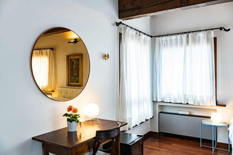 Apartment, 2 Bedrooms | Desk, blackout drapes, iron/ironing board (on request), cribs (free)