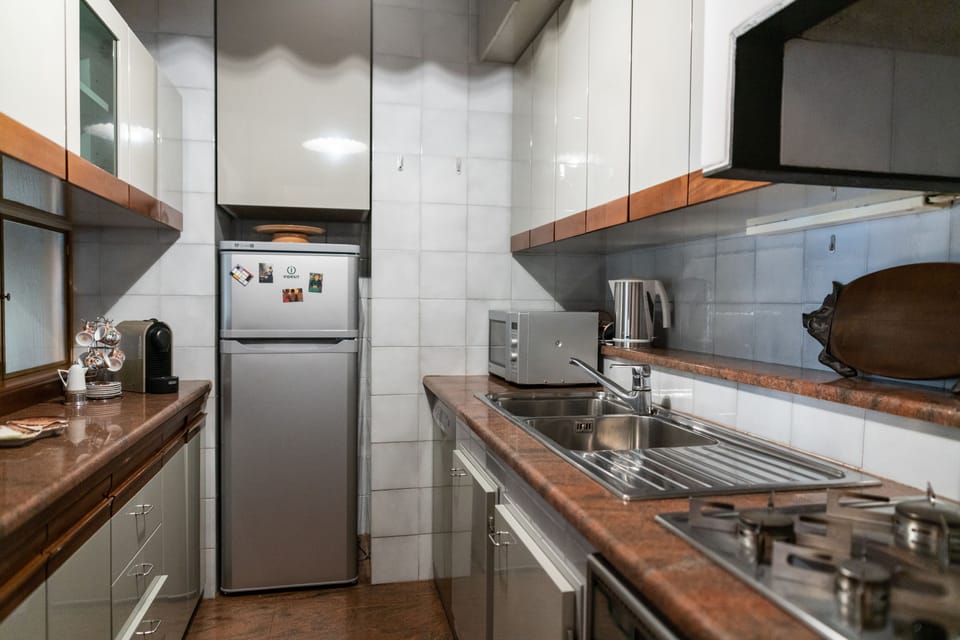 Apartment, 2 Bedrooms | Private kitchen | Shared fridge, microwave, stovetop, dishwasher