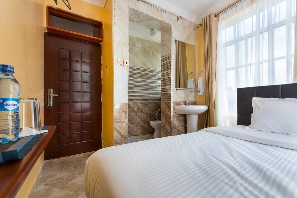 Premium bedding, memory foam beds, desk, laptop workspace
