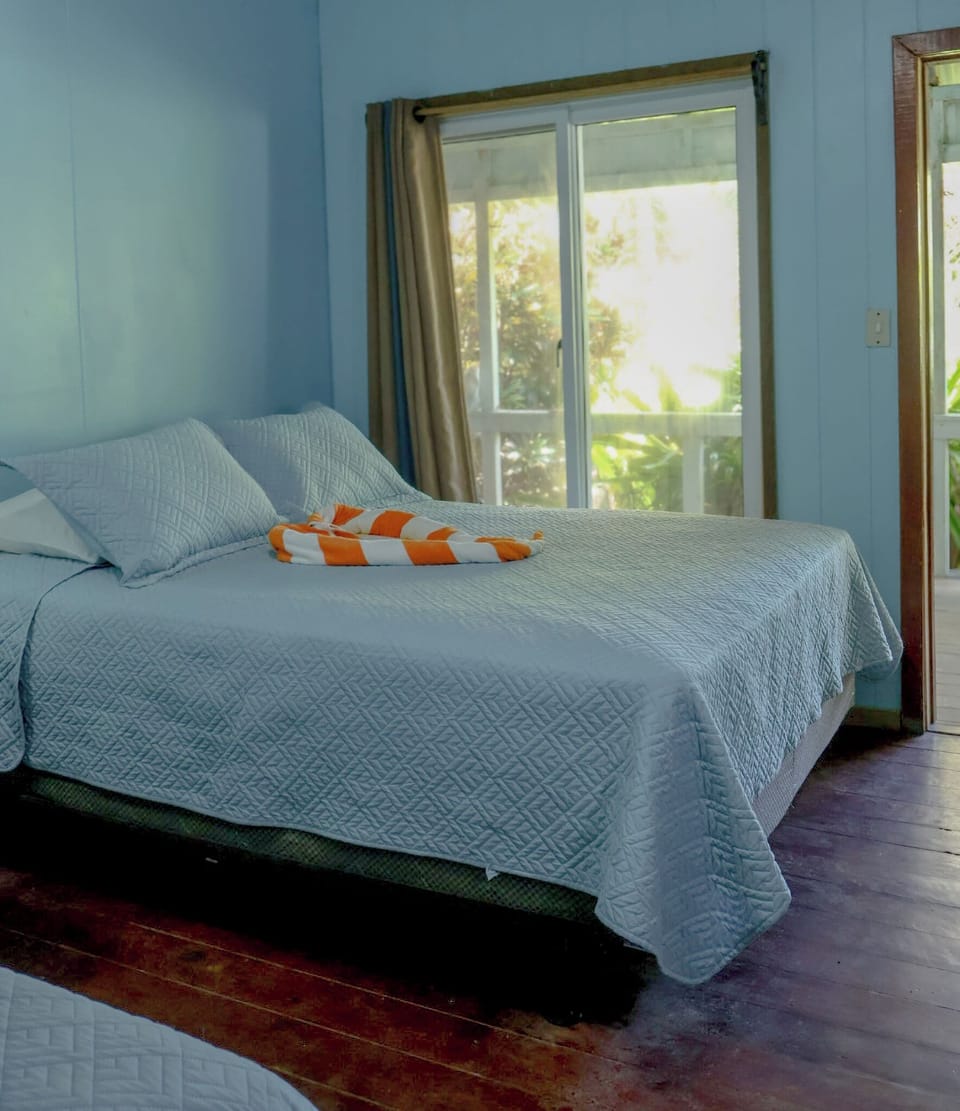 Basic Room, 2 Queen Beds, Sea View | Pillowtop beds, bed sheets