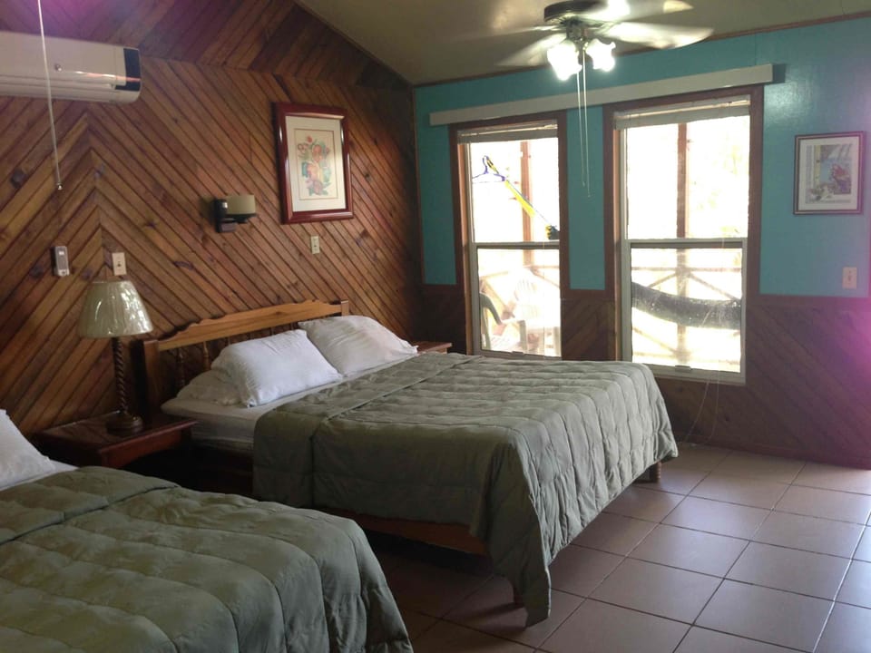 Basic Room, 2 Queen Beds, Sea View | Pillowtop beds, bed sheets