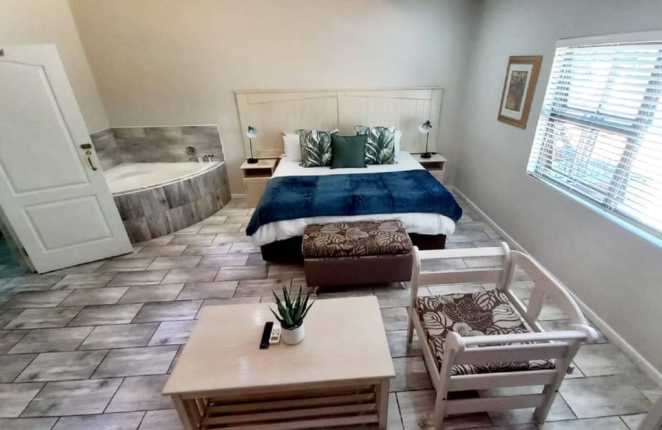 Oxford House Deluxe Room | 1 bedroom, in-room safe, individually decorated, desk