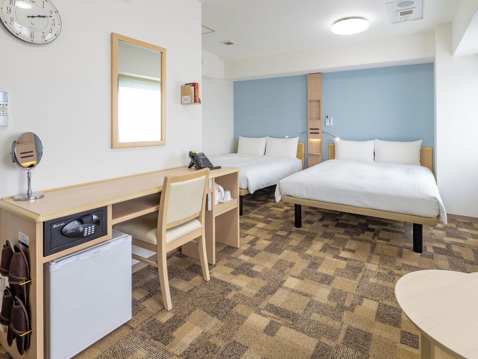 Deluxe Twin Room, Non Smoking | Down comforters, desk, blackout drapes, iron/ironing board