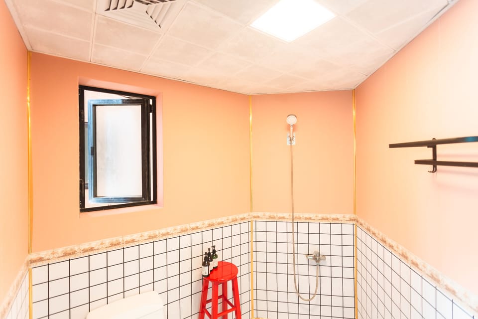 Panoramic Condo (Chinese Domestic Guests Only) | Bathroom | Shower, rainfall showerhead, free toiletries, hair dryer