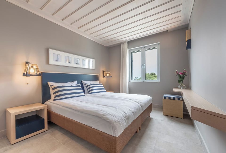 Comfort Apartment, 1 Bedroom | Minibar, in-room safe, desk, soundproofing