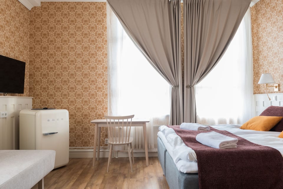 Deluxe Double Room, Private Bathroom, Lake View | Minibar, desk, laptop workspace, free WiFi