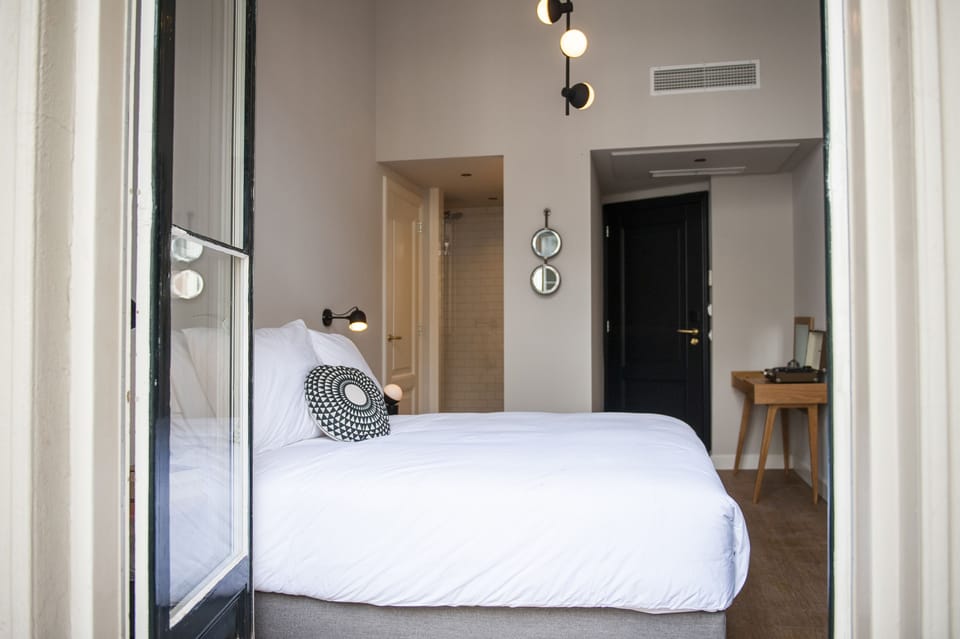 Small Boutique | Premium bedding, in-room safe, desk, blackout drapes