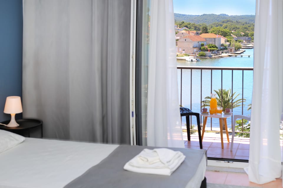 Standard Twin Room, Sea View | Premium bedding, down comforters, pillowtop beds, in-room safe