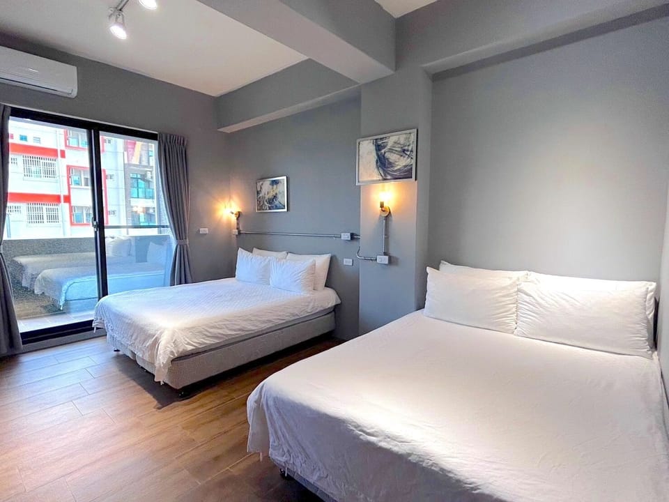 Standard Quadruple Room, Balcony | Blackout drapes, free WiFi