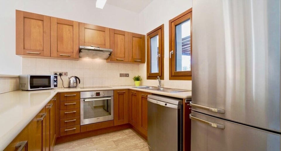 Villa | Private kitchen | Coffee/tea maker, full-size fridge, microwave, oven