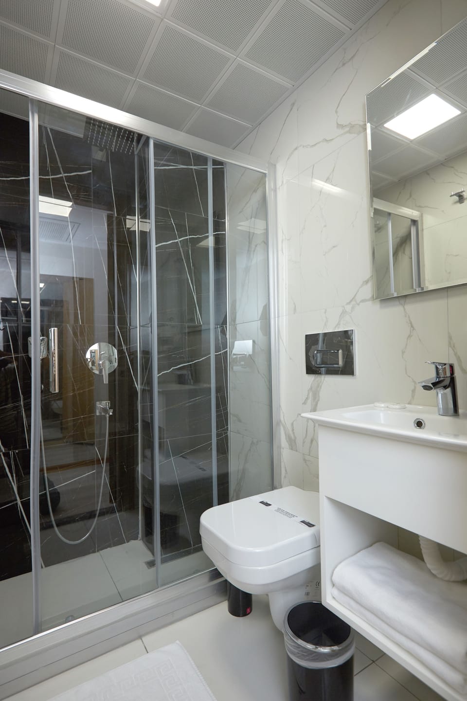 Economy Double Room, City View | Bathroom | Shower, free toiletries, hair dryer, slippers