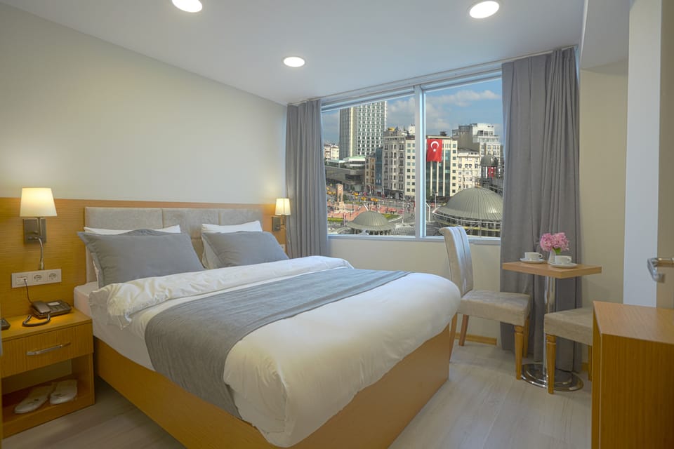 Economy Double Room, City View | Premium bedding, minibar, in-room safe, desk