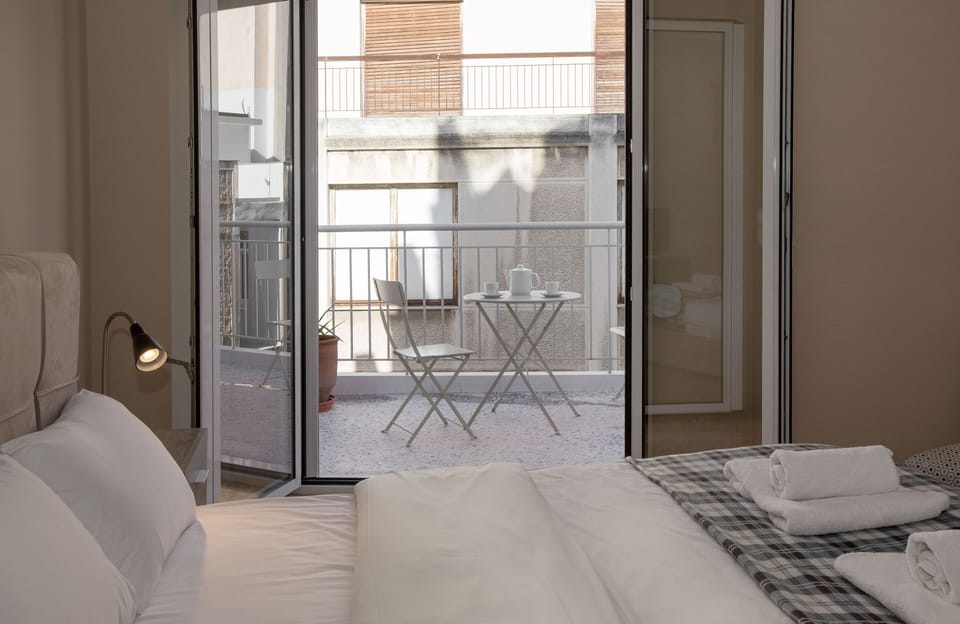 Apartment, 2 Bedrooms, Patio | 2 bedrooms, individually furnished, laptop workspace, iron/ironing board