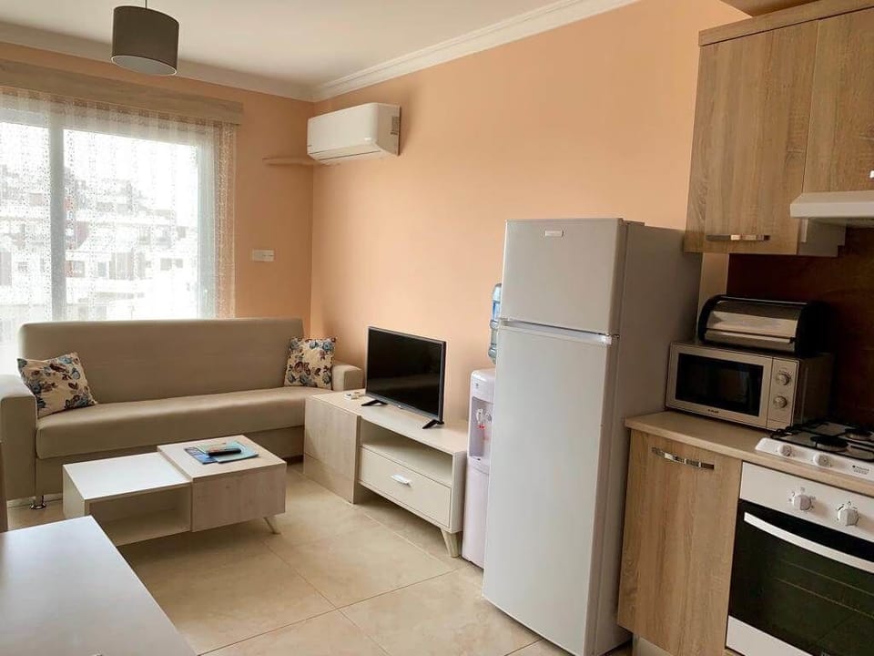 Apartment, Balcony, Sea View | Living area | TV