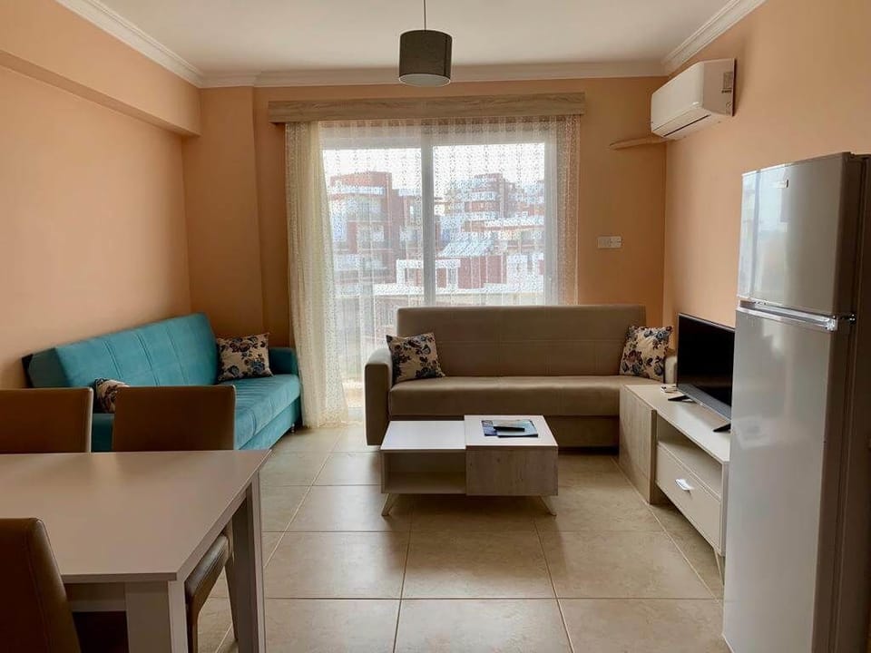 Apartment, Balcony, Sea View | Living area | TV