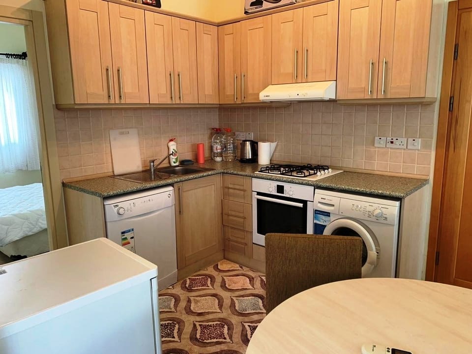 Comfort Apartment, 1 Bedroom, Balcony, Sea View | Private kitchen | Coffee/tea maker, full-size fridge, microwave, oven
