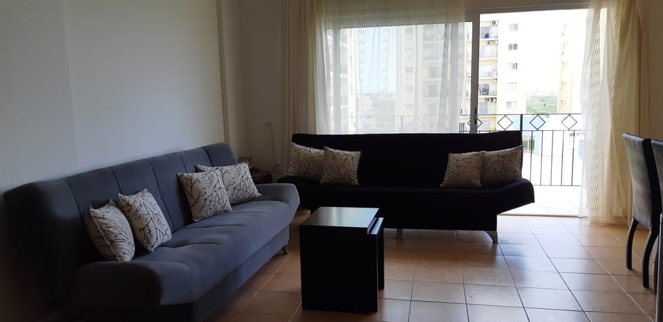 Comfort Apartment, 2 Bedrooms, Balcony, Garden View | Living area | Flat-screen TV