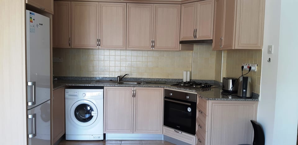 Comfort Apartment, 2 Bedrooms, Balcony, Garden View | Private kitchen | Coffee/tea maker, full-size fridge, microwave, oven