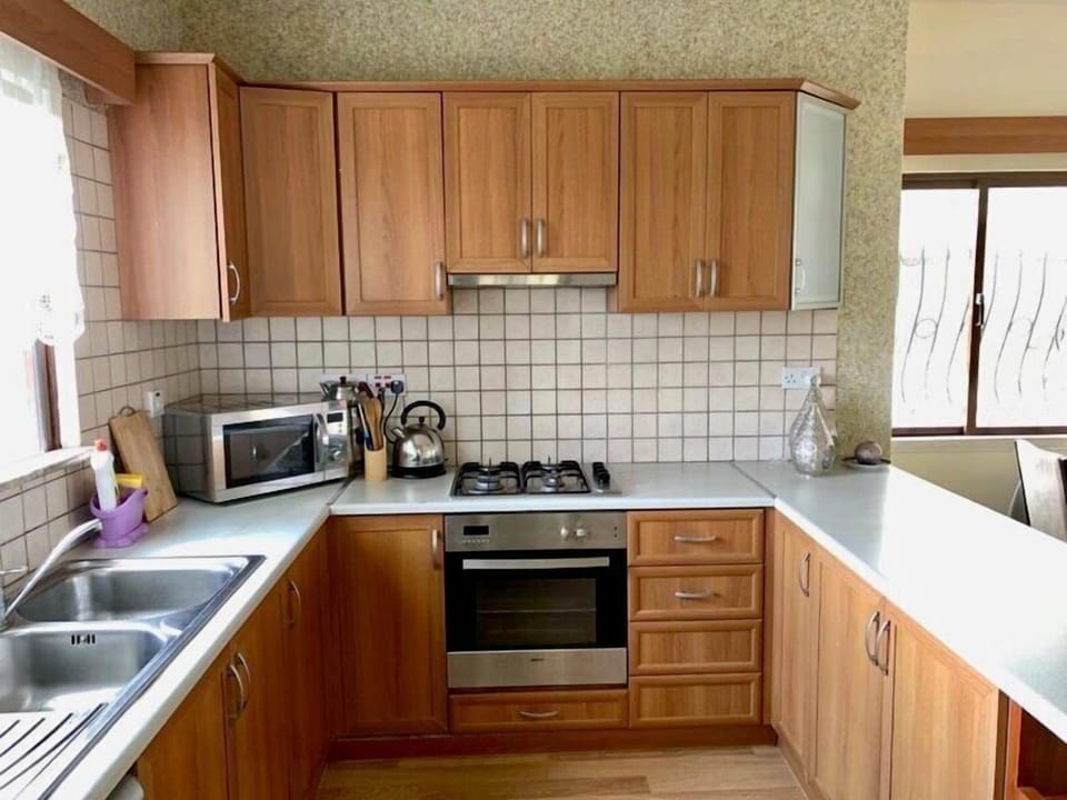 Panoramic Villa, 3 Bedrooms, Balcony, Sea View | Private kitchen | Coffee/tea maker, full-size fridge, microwave, oven