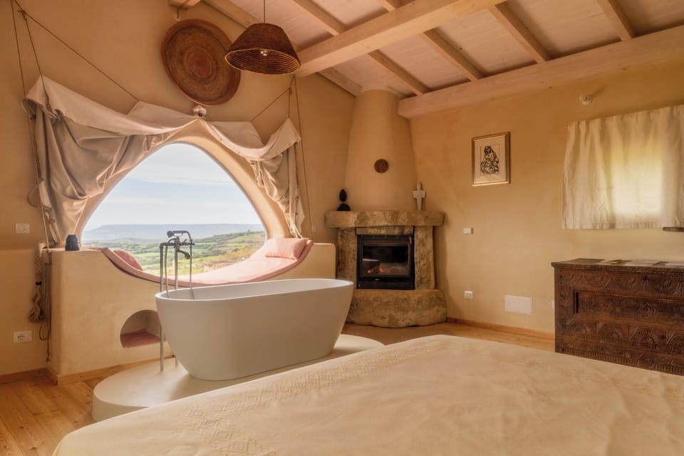 Junior Double Room, Fireplace, Pool View | Premium bedding, down comforters, individually decorated
