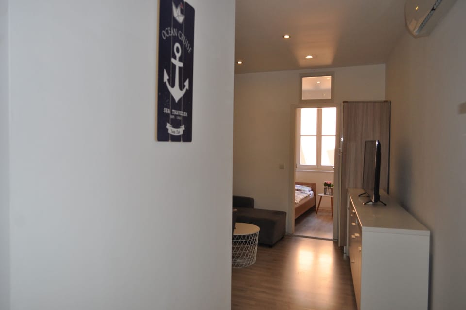 Apartment, 2 Bedrooms | Living area | Flat-screen TV
