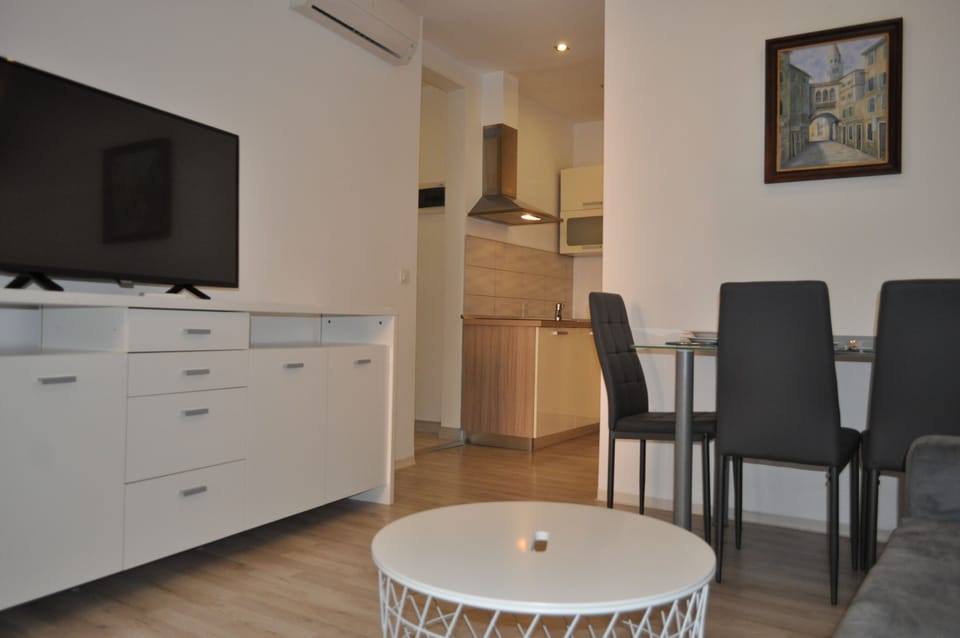 Apartment, 2 Bedrooms | Living area | Flat-screen TV