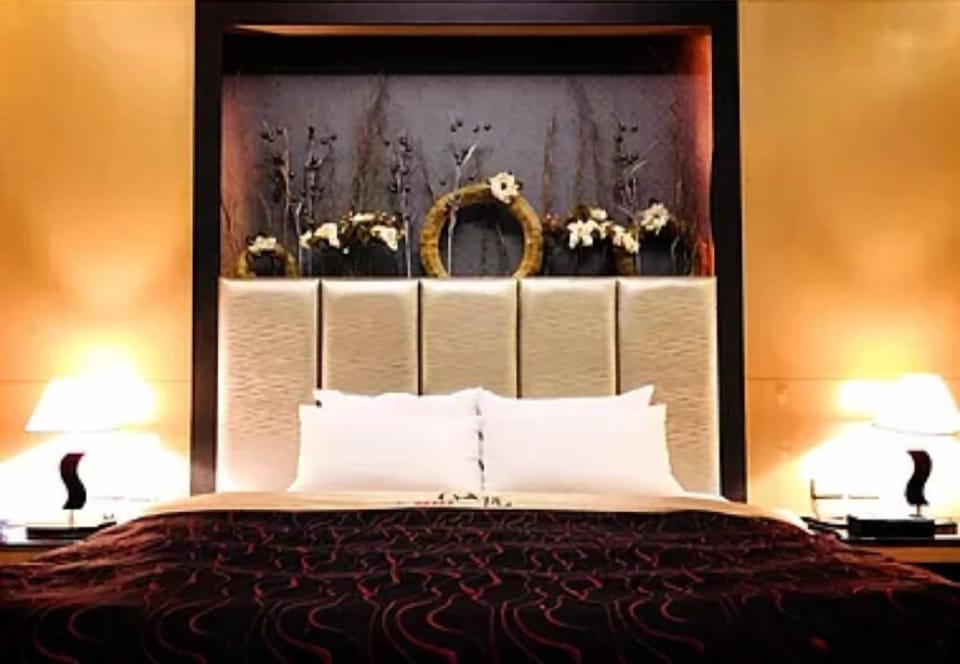 Deluxe Quadruple Room | Premium bedding, down comforters, desk, blackout drapes