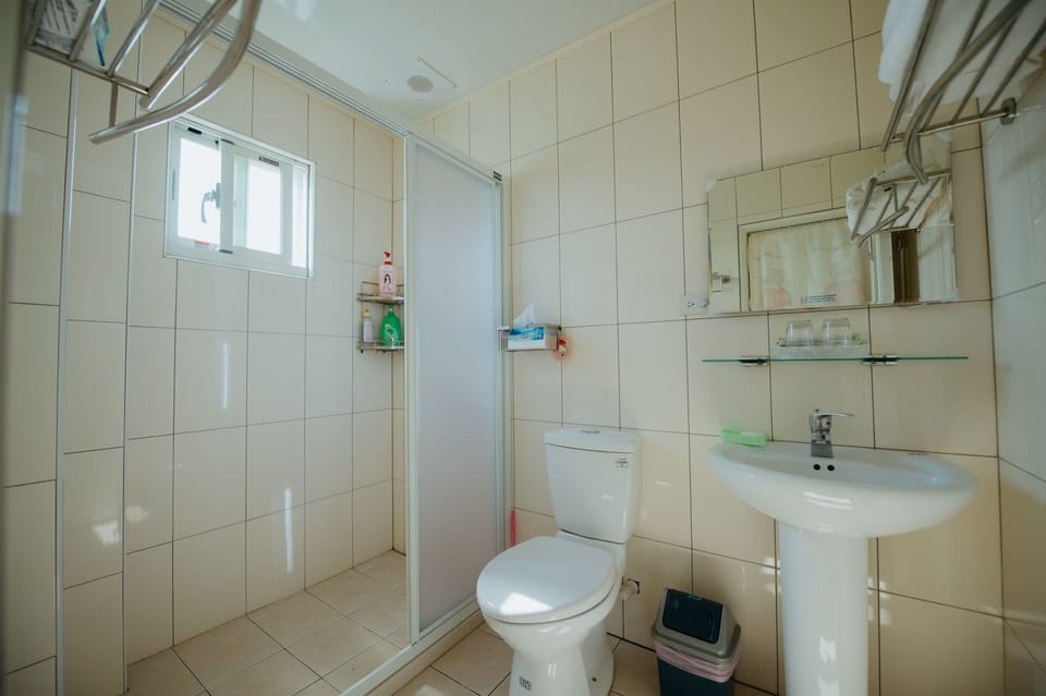 Deluxe Triple Room, Balcony, Courtyard Area | Bathroom | Shower, rainfall showerhead, free toiletries, hair dryer