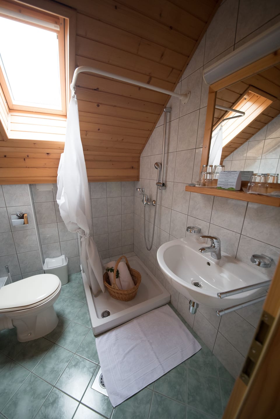 Triple Room, Multiple Beds | Bathroom | Shower, slippers, towels, toilet paper