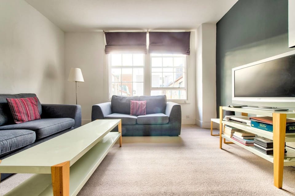 Apartment (1 Bedroom) | Living room | 24-inch flat-screen TV with cable channels