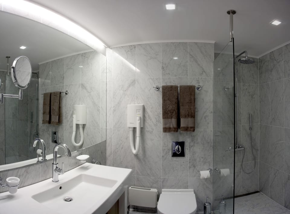 Standard Apartment, Sea View | Bathroom | Shower, designer toiletries, hair dryer, bathrobes