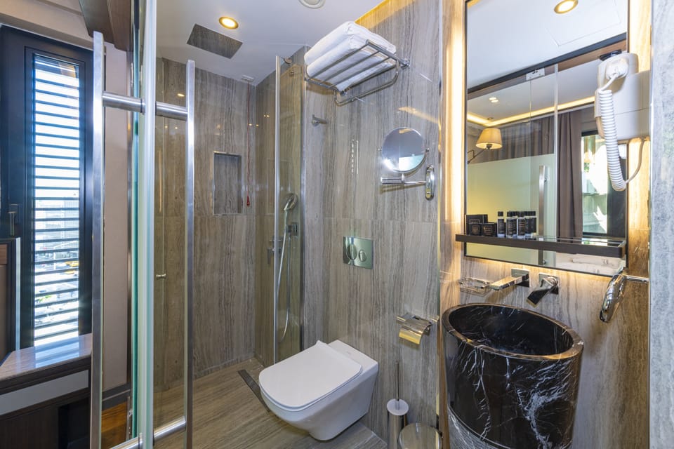 Shower, free toiletries, hair dryer, bathrobes