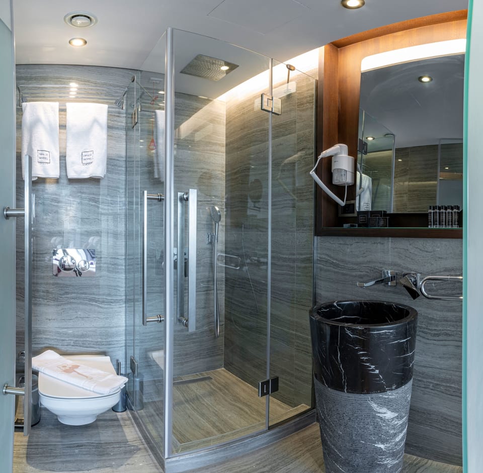 Shower, free toiletries, hair dryer, bathrobes