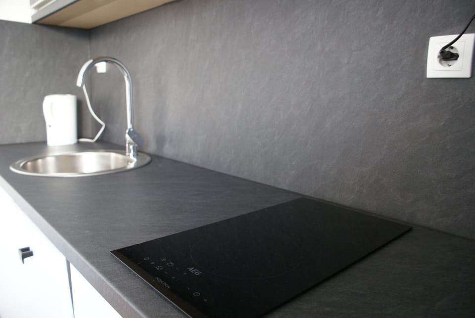 Standard Apartment, Garden View | Private kitchen | Fridge, microwave, freezer