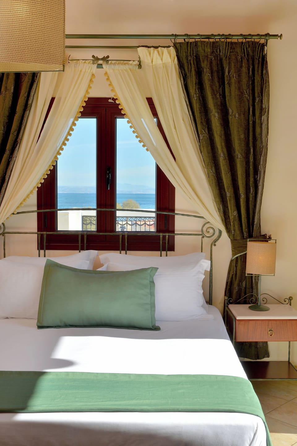 Standard Room, Partial Sea View | Pillowtop beds, free WiFi, bed sheets