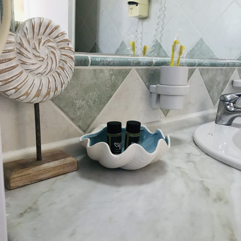 Basic Studio, 1 Double Bed with Sofa bed | Bathroom | Shower, rainfall showerhead, hair dryer, slippers