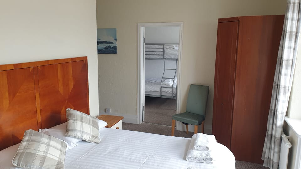 Family Room, Sea View | Iron/ironing board, free WiFi, bed sheets