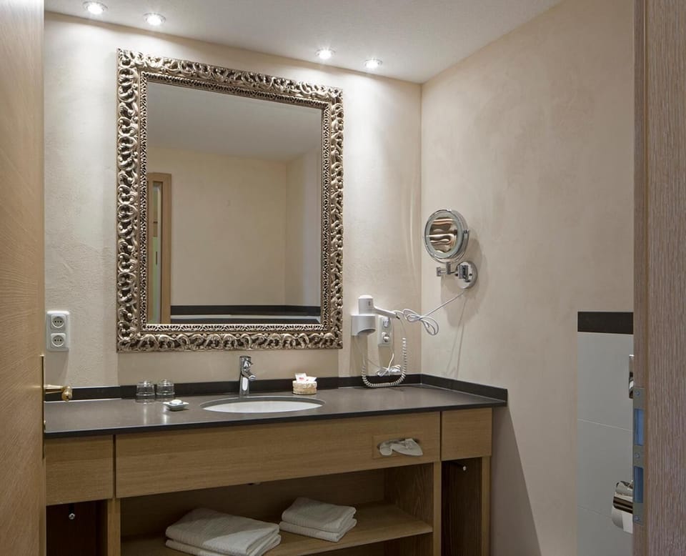 Hair dryer, towels, soap, shampoo