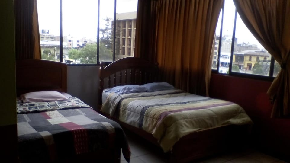 Family Room, Multiple Beds, City View | Free WiFi, bed sheets