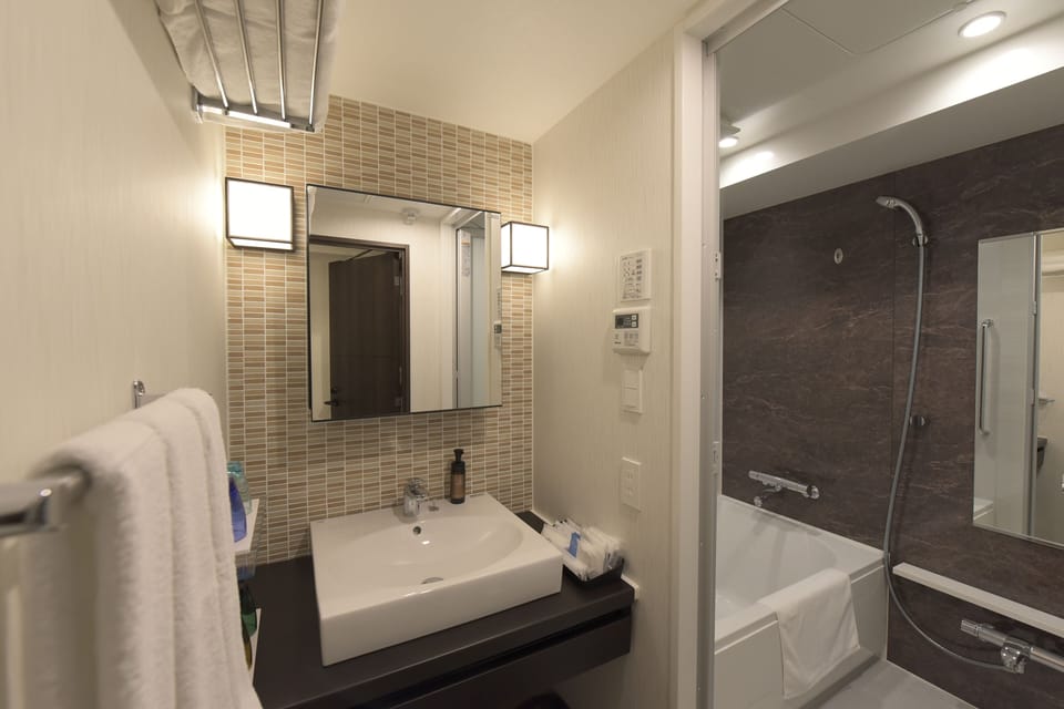 Japanese Western Style Corner Family Room, Non Smoking | Bathroom | Separate tub and shower, free toiletries, hair dryer, slippers