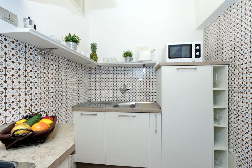 Apartment, 1 Bedroom | Private kitchen | Fridge, microwave, stovetop, dishwasher