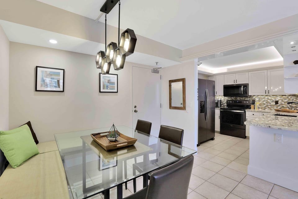 Condo, Multiple Beds (Alluring beachfront condo with pool a) | Private kitchen | Fridge, microwave, oven, stovetop