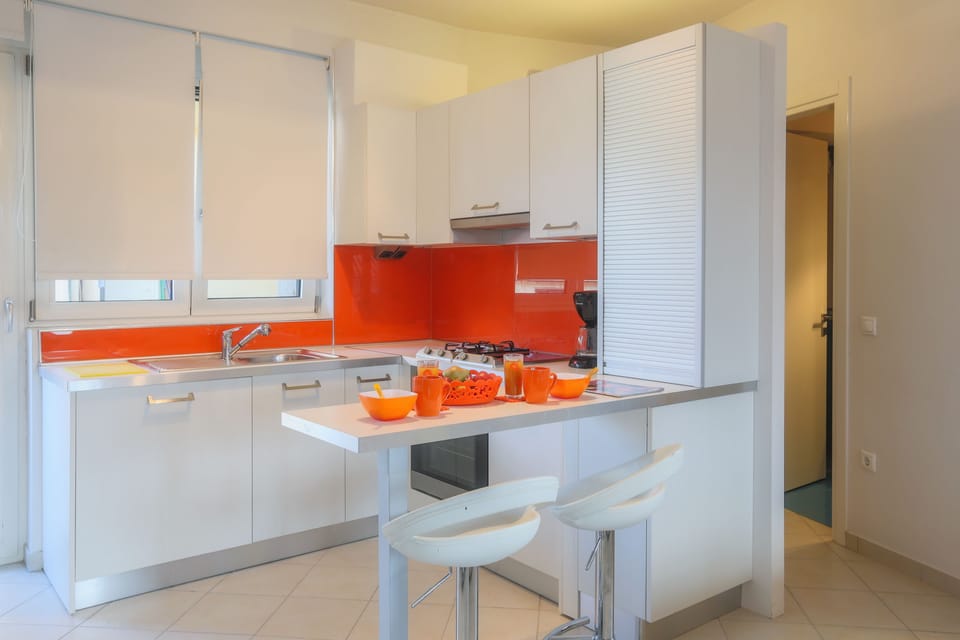 Apartment, 1 Bedroom | Private kitchen | Coffee/tea maker, electric kettle