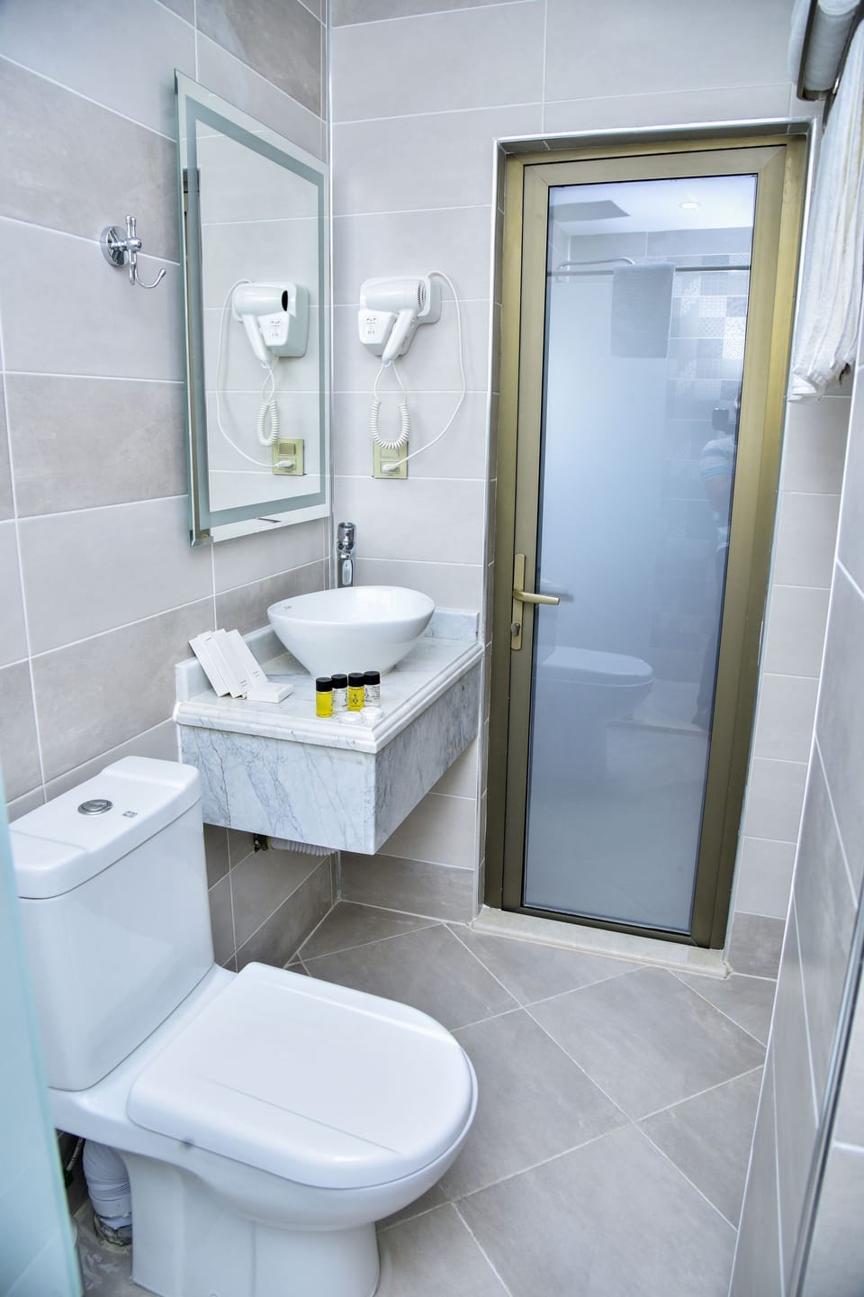 Family Room, 2 Bedrooms | Bathroom | Shower, hair dryer, slippers, towels